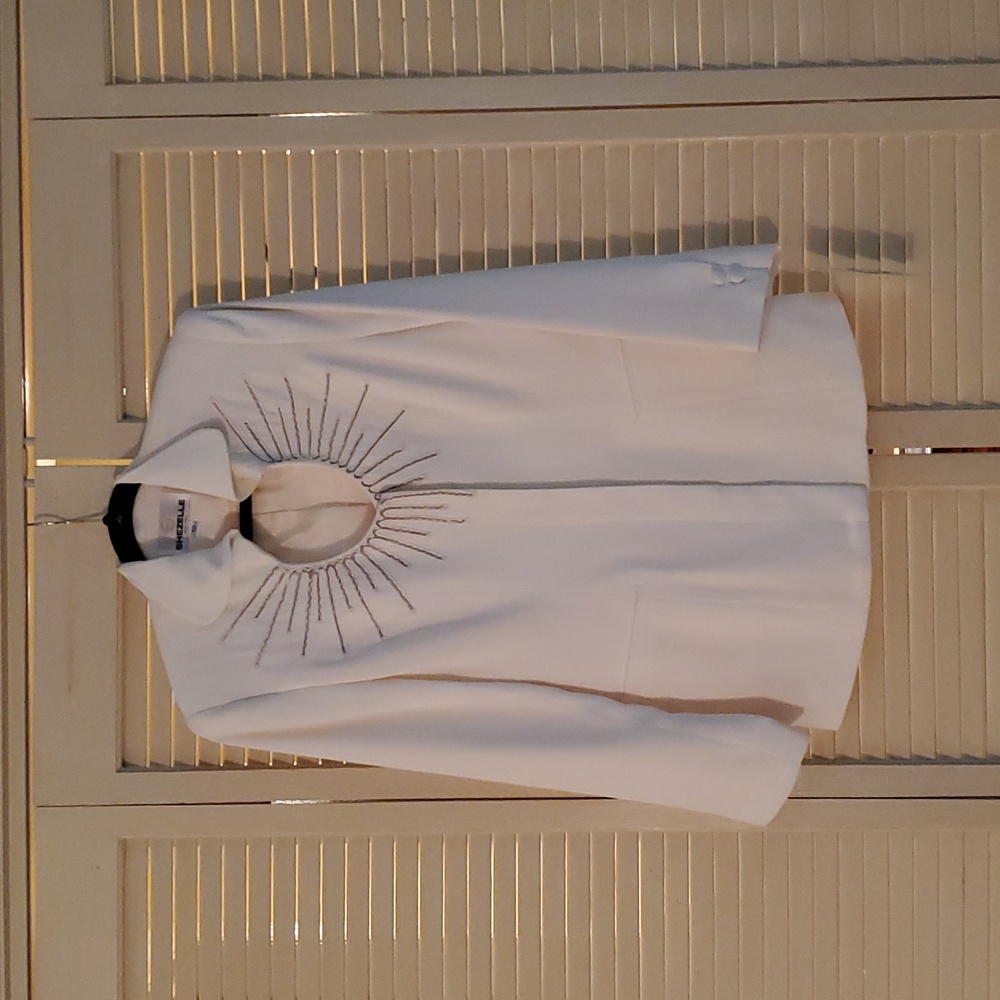 Cream color two peice suite. Brand New. By SHEZELLE, INC. New York. Size 12.